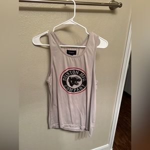 It’s a small Brixton tank top! Was not used so often! I outgrew it!